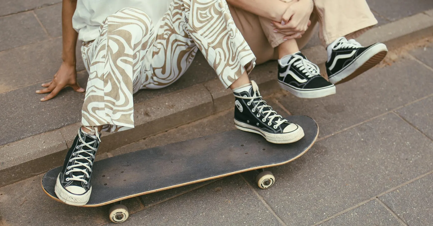 Photo of Vans and Converse shoes for the article on sneaker brands